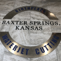 1-baxter-springs-floor-tile-birthplace-logo